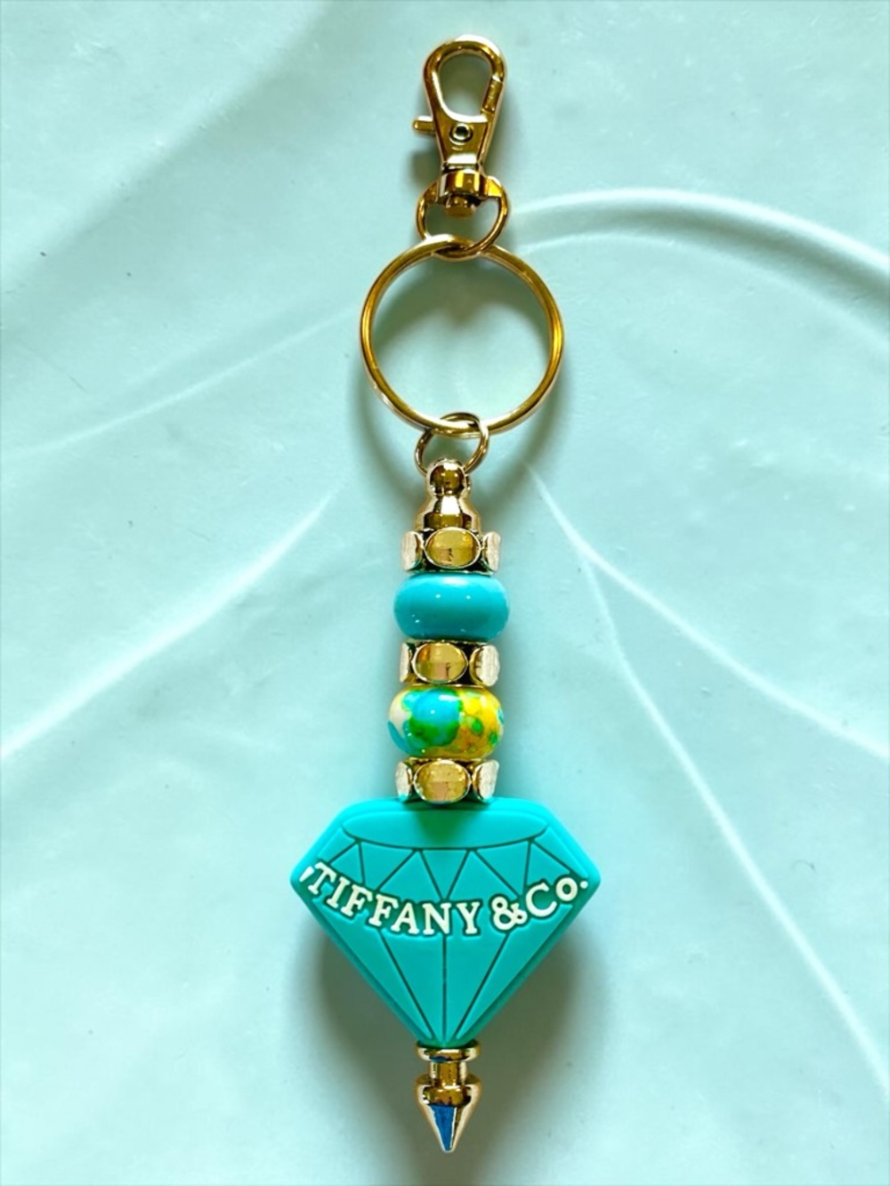 Fashion turquoise and stainless steel logo diamond charm keyring handmade